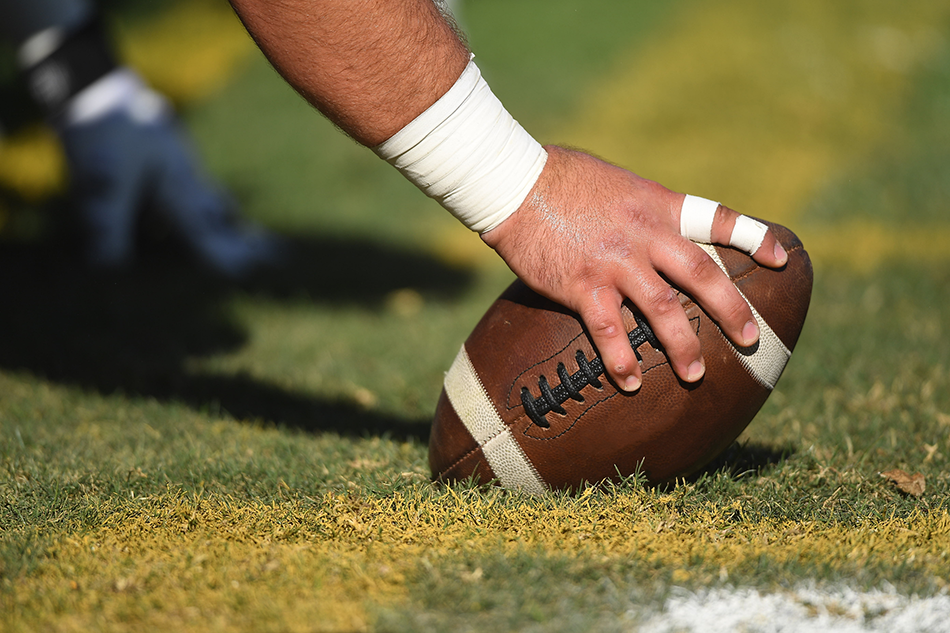 Player holding a football